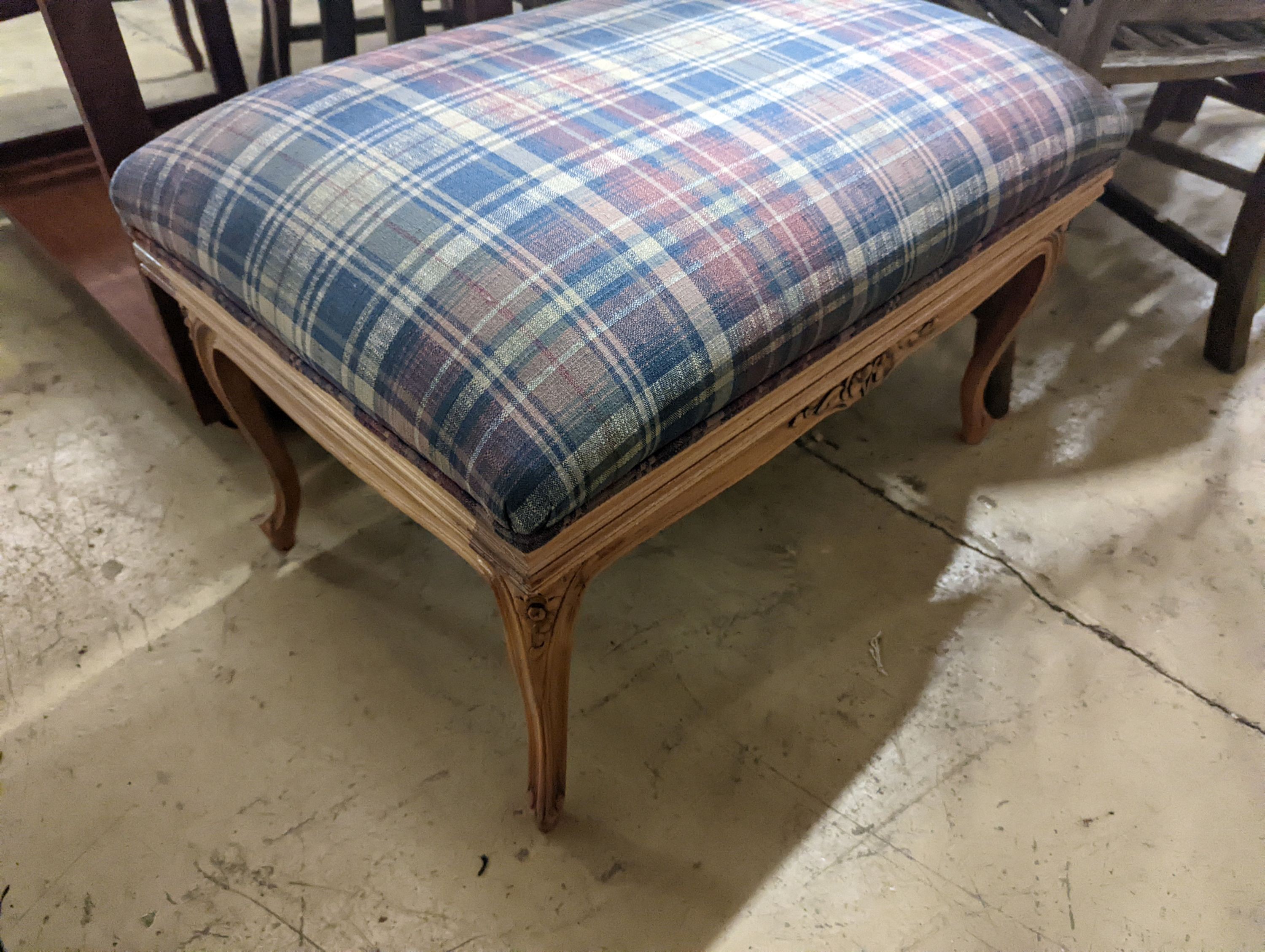 A pair of French carved beech upholstered stools combined luggage racks, width 80cm, depth 50cm, height 46cm